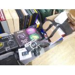 A box of assorted cameras and binoculars including Canon, vintage cameras etc.