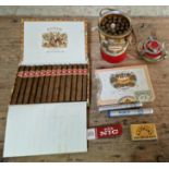 A collection of assorted cigars to include a box of 25 Punch Manuel Lopez (opened), a box of 25 H.