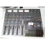 A Tascam 'Porta One' ministudio four track cassette recorder.