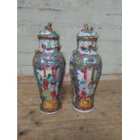 A pair 19th century Chinese Canton lidded vases, height 29cm.