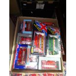 A box of boxed die-cast model buses.