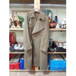 A WW2 British military coat, belonging to Lt Col Wingate, dated 1944.