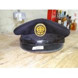 A WW2 visor cap for members of the German Labour Front (DAF) We believe this to be a genuine item,