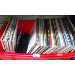 A box of LPs, 12" singles and 45s, mainly pop, circa 1970s and 80s.