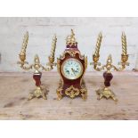 A late 19th century gilt metal mounted tortoiseshell clock garniture, height 35cm.