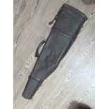 An antique leather leg of mutton shotgun case.