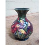 A Moorcroft pottery vase, height 12.5cm.