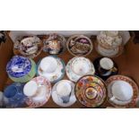 A box of cabinet cups and saucers, 19th century and later, including Wedgwood, Derby etc.