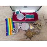A mixed lot of medals including a WWI 1914-15 star etc.