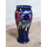 A Moorcroft pottery vase, height 28cm, (chip to rim and foot).