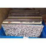A box of LPs to include Fleetwood Mac, Queen, Bob Marley, Beatles, Dexys Midnight Runners, AC DC,