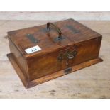 A 20th century cigar box with key, length 27cm.