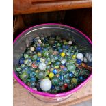 A tin of marbles.