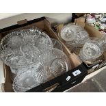 Two boxes of glassware to include cut glass trays, dishes, sundae dishes etc