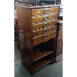 An Edwardian mahogany music cabinet.