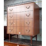 A Mid 20th century walnut chest of drawers.