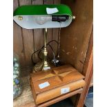 A banker's desk lamp with pull cord and a wooden cheroots box.