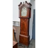 A 19th Century mahogany long case clock with rolling moon painted dial by Wignall, Ormskirk, with