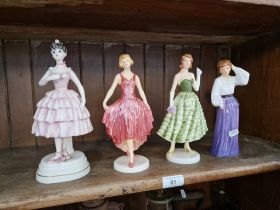 Four Goebel figurines.