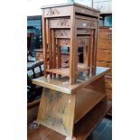 A Chinese carved wood nest of tables together with a Chinese carved wood coffee table.