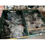 Two boxes of glassware to include drinking glasses, bowls, sundae dishes, pitcher etc