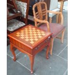A mahogany chess table with Napoleonic style cast metal pieces together with a 1930s chair.