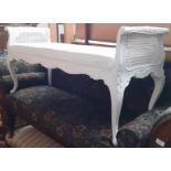 A French style white painted window seat, length 132cm.
