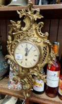 A Smiths 8 day gilt cartel wall clock, 48cm in height.