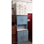 A 1950s metal kitchenette together with a 1950s metal kitchen chest of drawers.