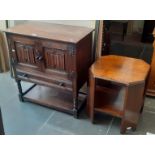 An oak side cabinet and an oak occasional table.