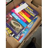 A box of approximately 40 friendly football programmes.