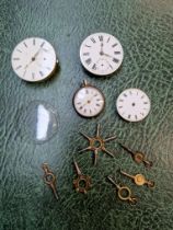 A box of pocketwatch movements and keys.
