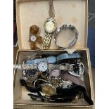 A box of assorted watches, etc.