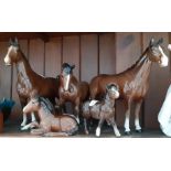 Five Beswick horses.