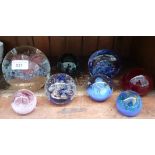 8 glass paperweights including an example by Jane Charles, four by Caithness etc.