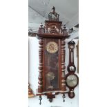 A large walnut case Vienna wall clock with key