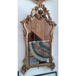 A gilt framed mirror, carved gilt wood frame with acanthus leaf decoration, circa 1900, later