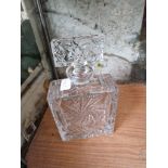 A cut glass decanter of square form, height 25.5cm.
