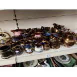 Brown lustre ware jugs etc - over 20 pieces