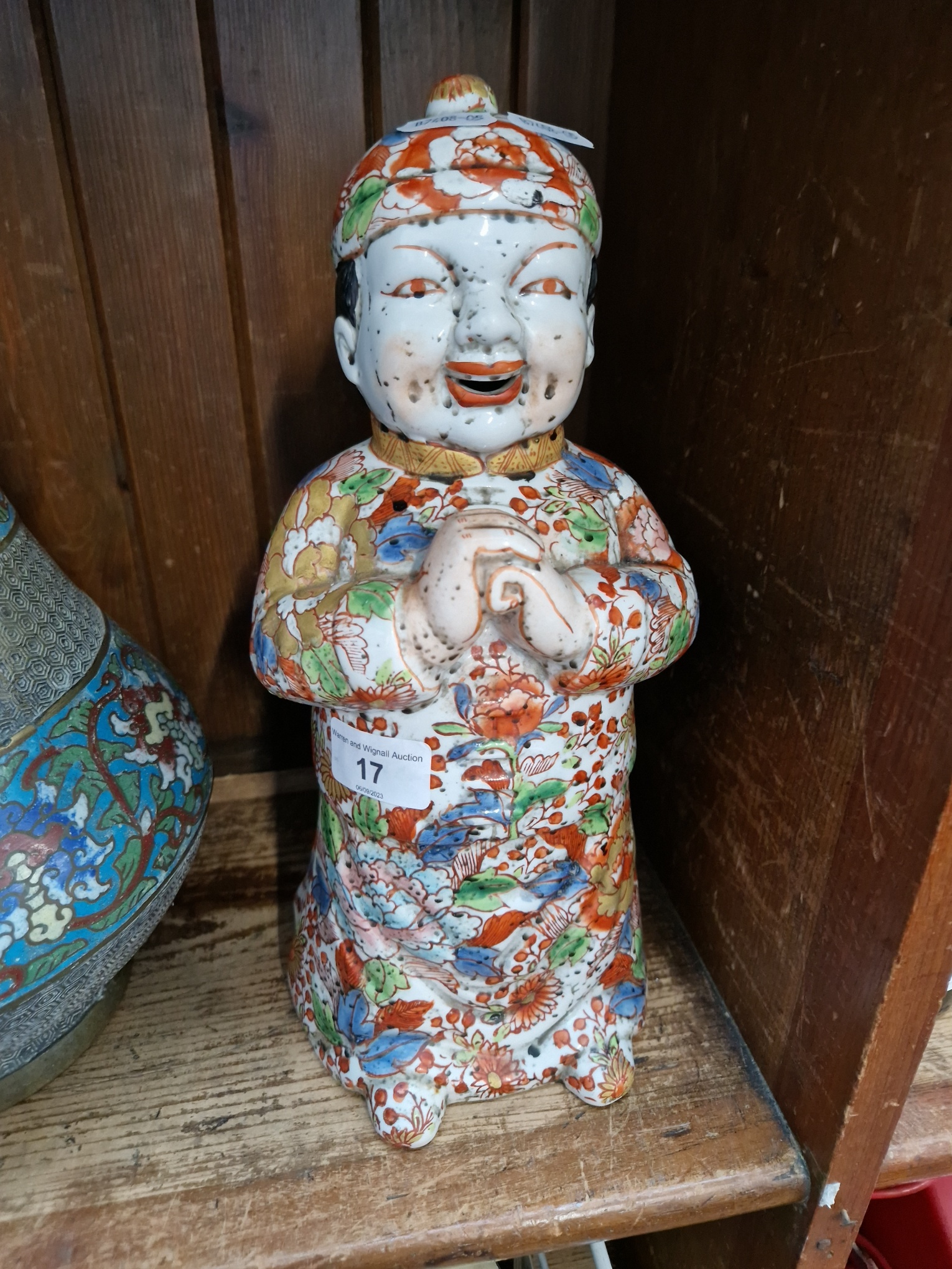 A Japanese ceramic figure, height 31cm.