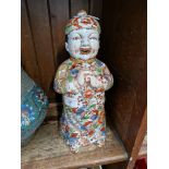 A Japanese ceramic figure, height 31cm.