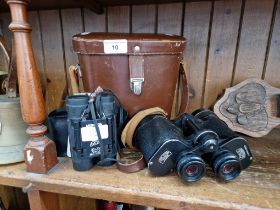A pair of Carl Zeiss binoculars in case together with a pair of Miranda binoculars.
