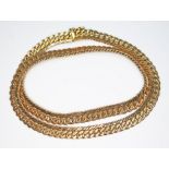 A double figaro and snake link choker necklace, 9ct gold import marks, length 41cm, wt. 22.9g.