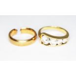 Two rings; one set with CZs and a wedding band (cut), both marked '18Kt', gross wt. 10.1g.