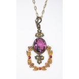 A purple paste, ruby and split pearl pendant, maker's mark 'T+H', otherwise unmarked, length 46mm,