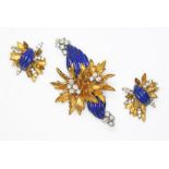 A Kutchinsky brooch and earring set, the brooch designed as two 18ct yellow gold flowers with