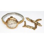 A ladies 9ct gold Rolco wristwatch with strap marked '9ct', both as found.