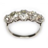 An antique five stone diamond ring, the old cut stones weighing approx. 0.31, 0.62, 0.83, 0.61 & 0.