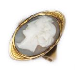An early 19th century cameo ring, the head approx. 26mm x 14mm, initialled 'MC' otherwise