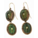 A pair of antique scarab beetle drop earrings, length 50mm, yellow metal unmarked, with a spare